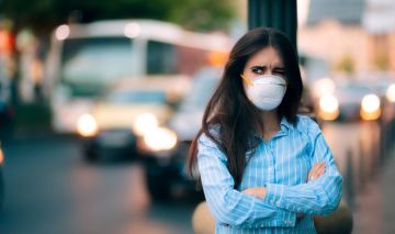 mujer contaminación 