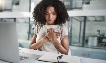 mujer sintomas infarto